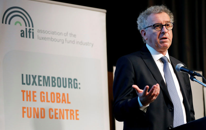 © Reuters. FILE PHOTO: Luxembourg's FM Gramegna makes a speech at the Association Of The Luxembourg Fund Industry's Asia Roadshow event in Tokyo