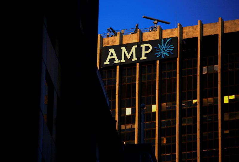 © Reuters. FILE PHOTO: The logo of AMP Ltd, Australia's biggest retail wealth manager, adorns their head office located in central Sydney, Australia