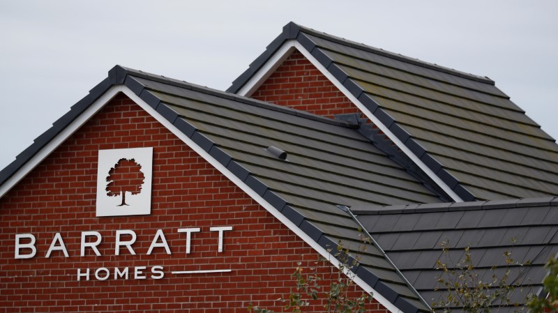 © Reuters. A company logo is seen on the side of a house at a Barratt Homes housing development near Preston