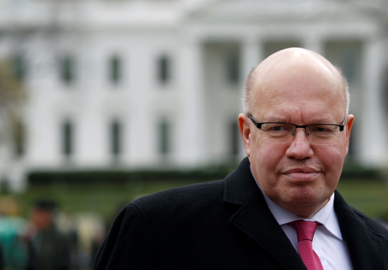 © Reuters. German Economic Minister Peter Altmaier leaves after delivering a statement regarding the Trump Administration's steel and aluminium tariffs, outside of the White House in Washington