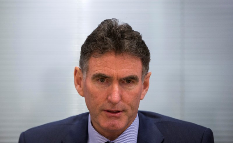 © Reuters. FILE PHOTO: Royal Bank of Scotland chief executive Ross McEwan speaks during an interview with Reuters at Canary Wharf in London