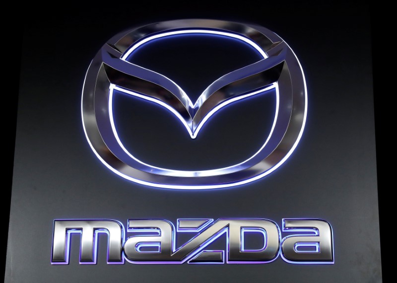 © Reuters. The logo of Mazda Motor Corp. is displayed at the company's news conference venue in Tokyo