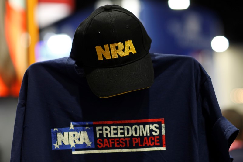 © Reuters. A cap and shirt are displayed at the booth for the National Rifle Association (NRA) at the Conservative Political Action Conference (CPAC) at National Harbor, Maryland