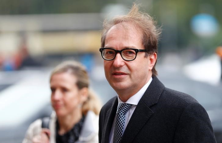 © Reuters. Dobrindt of CSU, arrives at the German Parliamentary Society offices before the start of exploratory talks about forming a new coalition government in Berlin