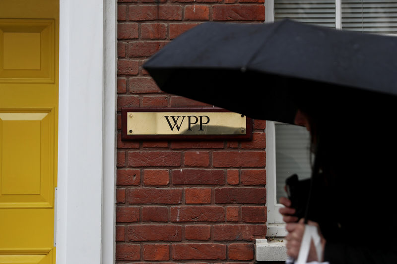 © Reuters. FILE PHOTO: A logo hangs on the wall outside the WPP offices in London