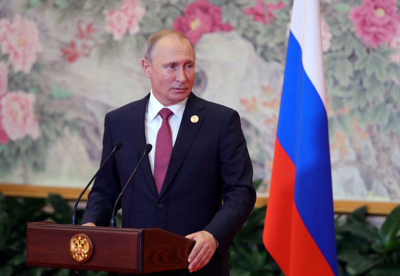 © Reuters. Presidente russo, Vladimir Putin, dá entrevista coletiva em Qingdao