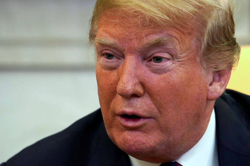 © Reuters. FILE PHOTO:  U.S. President Donald Trump talks to the media in the Oval Office of the White House in Washington