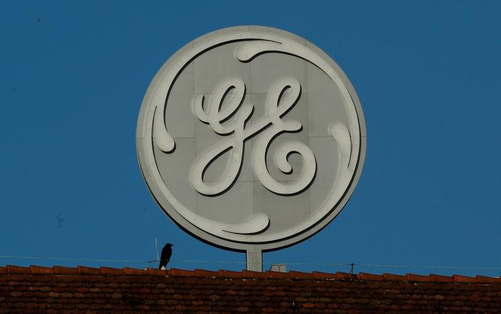 © Reuters. GE DEVRA PAYER S'IL NE TIENT PAS SES ENGAGEMENTS, DÉCLARE GRIVEAUX