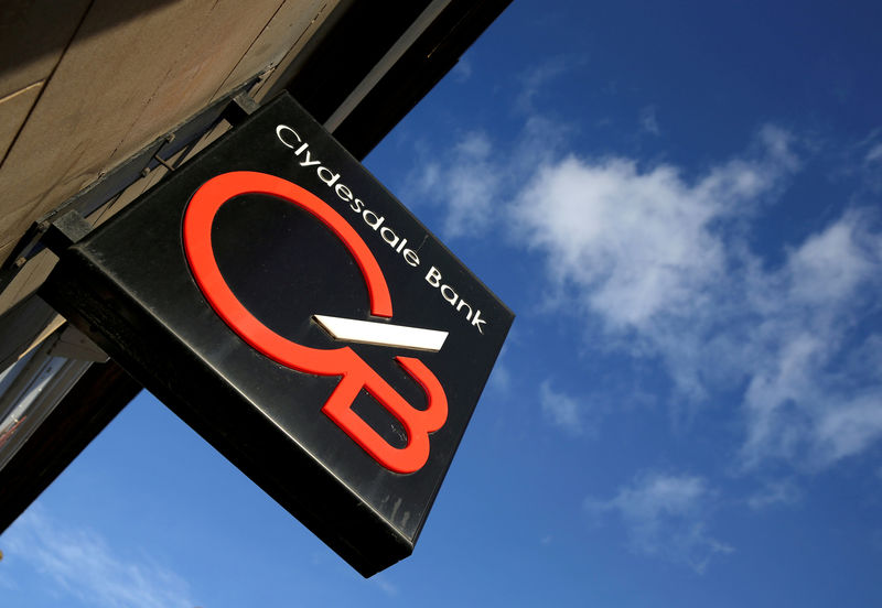 © Reuters. FILE PHOTO: A sign hangs outside a Clydesdale Bank in Edinburgh, Scotland