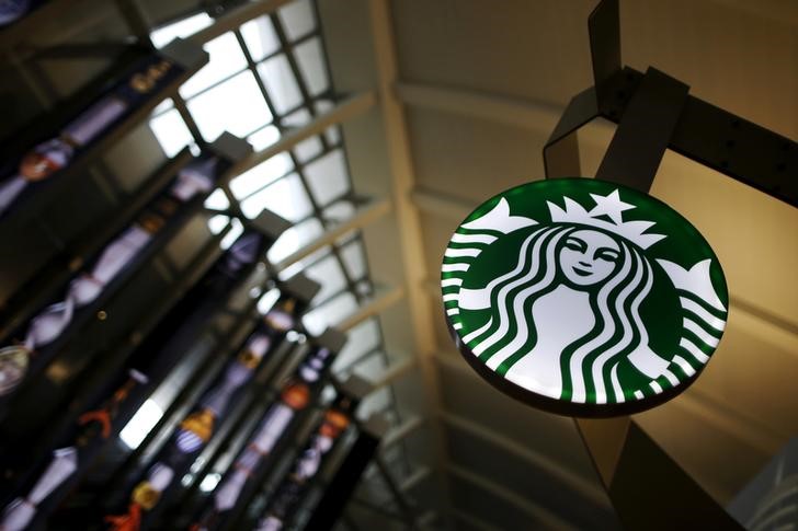 © Reuters. FILE PHOTO: A Starbucks store is seen inside the Tom Bradley terminal at LAX airport in Los Angeles
