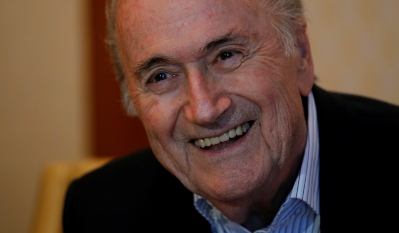 © Reuters. Former FIFA President Blatter smiles during an interview with Reuters in Zurich