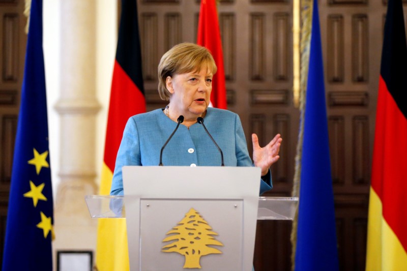 © Reuters. German Chancellor Angela Merkel speaks during a joint conference at the government palace in Beirut