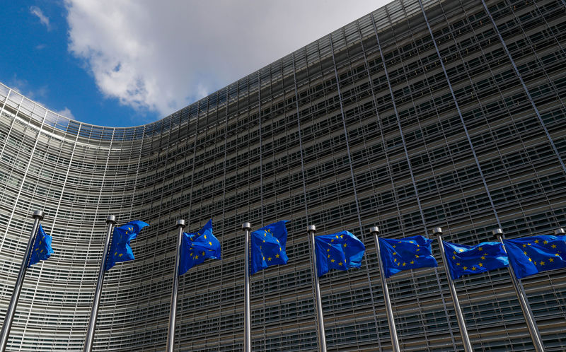 © Reuters. European Union flag flutter outside the EU Commission headquarters in Brussels