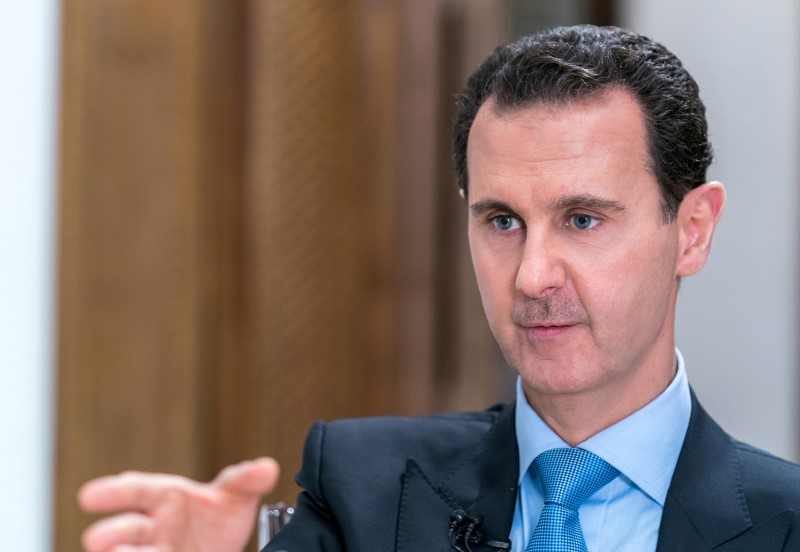 © Reuters. الأسد يعد باستعادة السيطرة على شمال سوريا بالقوة إذا اقتضى الأمر
