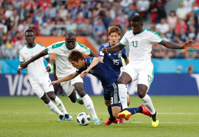 © Reuters. ندياي: السنغال عانت في التعامل مع تحركات لاعبي اليابان