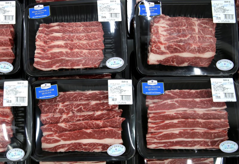 © Reuters. FILE PHOTO:  Beef steaks are placed for sale at a Sam's Club store of Wal-Mart in Beijing