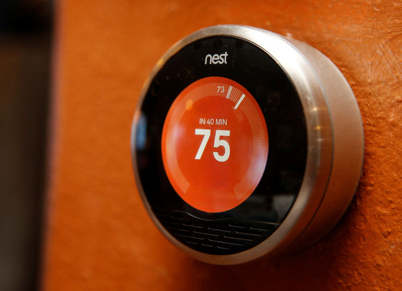 © Reuters. FILE PHOTO:    A Nest thermostat is installed in a home in Provo