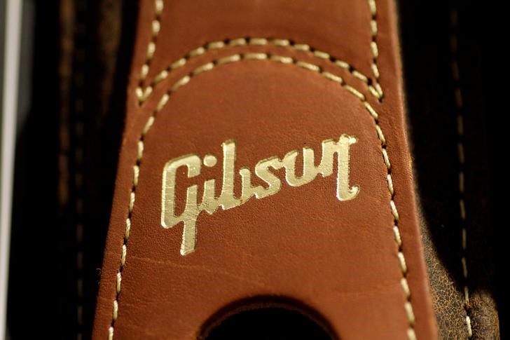 © Reuters. The Gibson logo is seen on a guitar strap at a store in Singapore