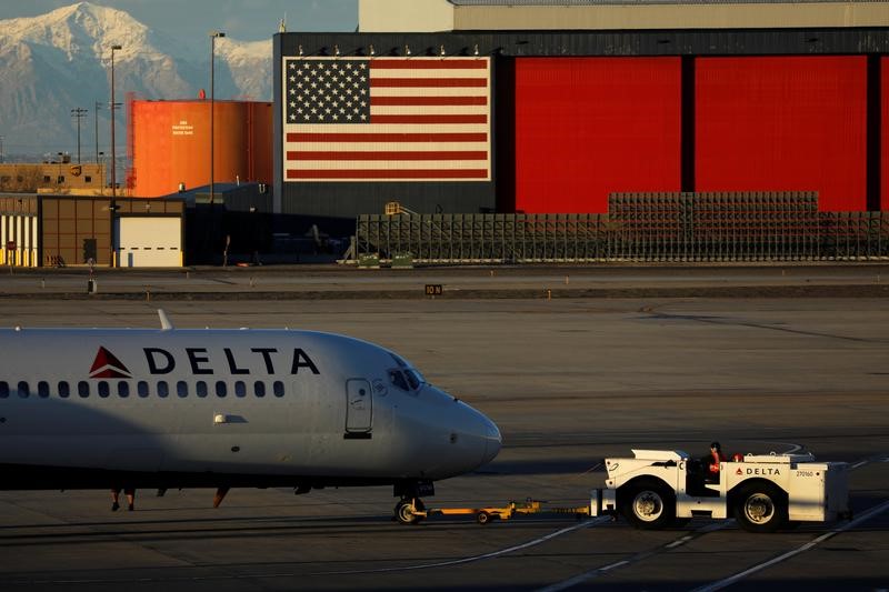 © Reuters. A Delta Airlines flight is pushed put of its gate at the airport in Salt Lake City,