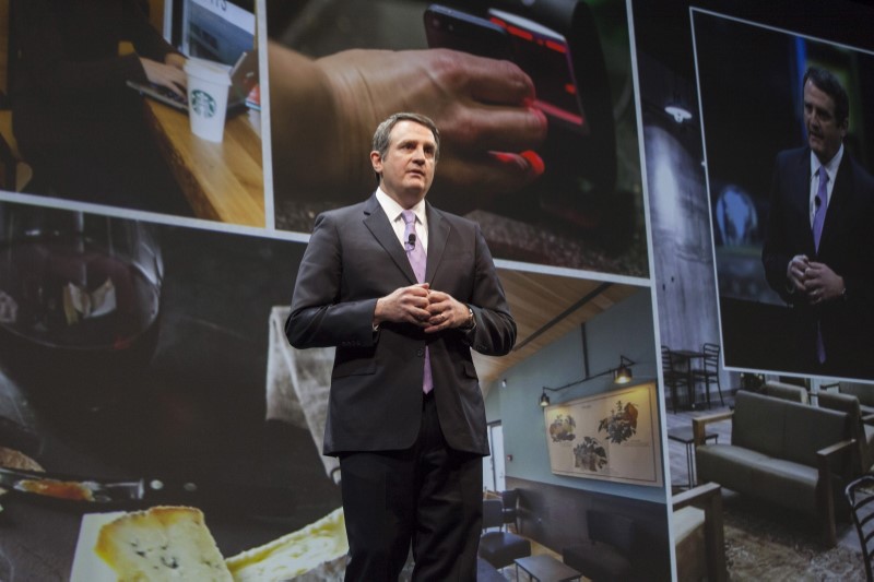 © Reuters. Starbucks CFO Scott Maw speaks during the company's annual shareholder's meeting in Seattle, Washington