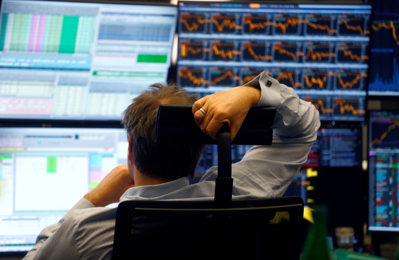 © Reuters. FILE PHOTO: A trader works at Frankfurt's stock exchange in Frankfurt