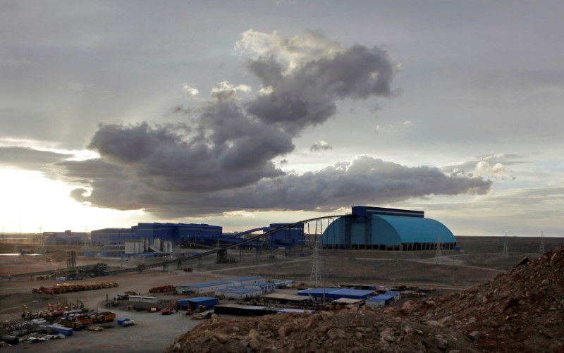 © Reuters. FILE PHOTO: Storm clouds are seen above the Oyu Tolgoi mine in Mongolia's South Gobi region