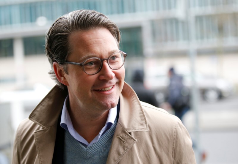 © Reuters. FILE PHOTO: Scheuer of the Christian Social Union (CSU) arrives for coalition talks about forming a new coalition government at the CDU headquarters in Berlin