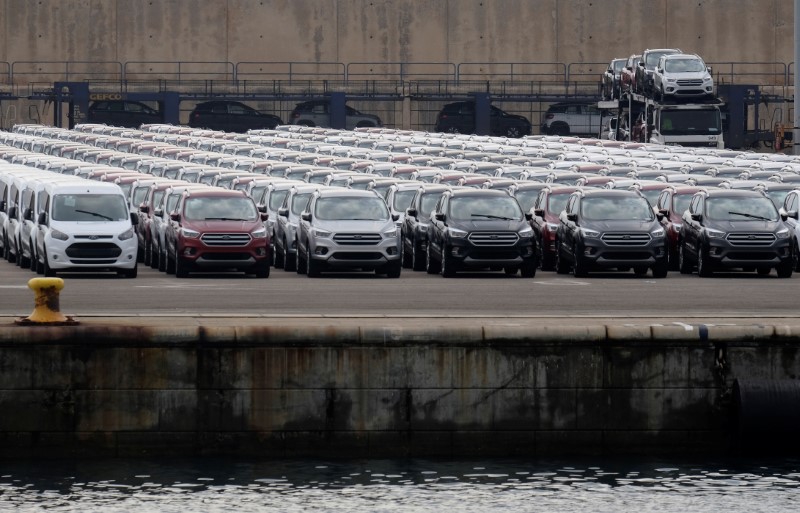 © Reuters. FILE PHOTO - Parked cars are pictures at the car terminal at the port of Valencia