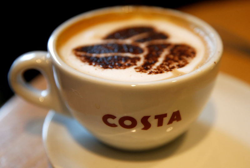 © Reuters. FILE PHOTO: A Cappuccino stands on a table at a branch of Costa coffee in Manchester northern England.