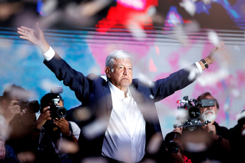 © Reuters. Presidential candidate Andres Manuel Lopez Obrador gestures as he addresses supporters after polls closed in the presidential election, in Mexico City