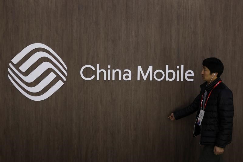 © Reuters. LA MAISON BLANCHE VEUT EMPÊCHER CHINA MOBILE D'OPÉRER AUX USA