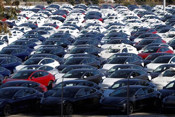 © Reuters. FILE PHOTO: A parking lot of predominantly new Tesla Model 3 electric vehicles is seen in Richmond, California