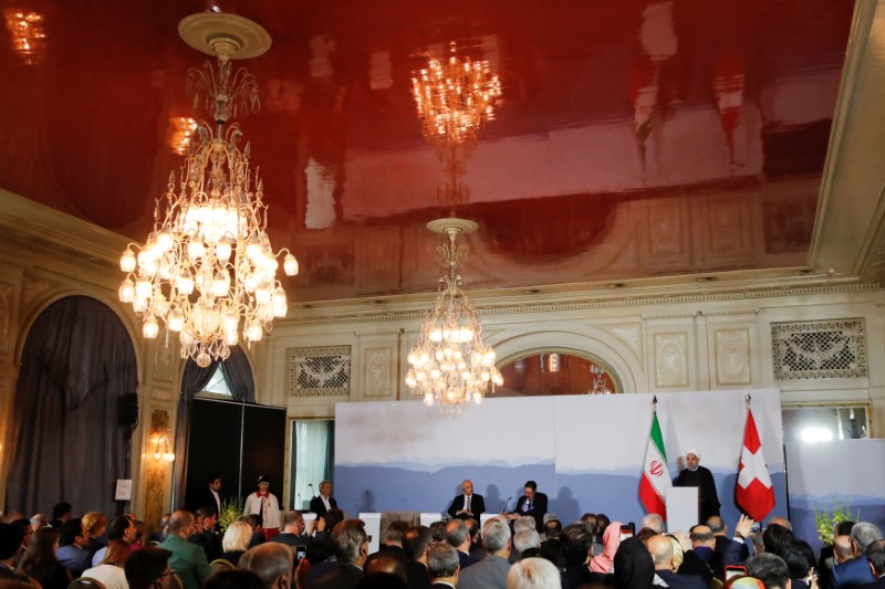 © Reuters. Iranian President Hassan Rouhani addresses the Innovation and Industry Forum during an official visit in Bern