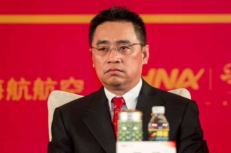 © Reuters. FILE PHOTO -  Wang Jian, Co-Chairman of HNA Group attends a meeting marking the 20th anniversary of company's founding in Haikou, Hainan