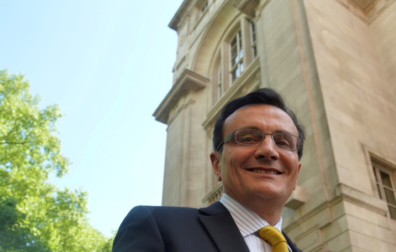 © Reuters. FILE PHOTO: Chief Executive of AstraZeneca Pascal Soriot smiles as he leaves a television studio at Millbank in London