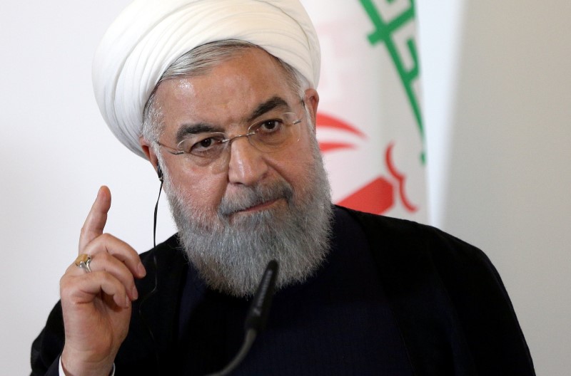 © Reuters. FILE PHOTO: Iran's President Hassan Rouhani attends a news conference at the Chancellery in Vienna