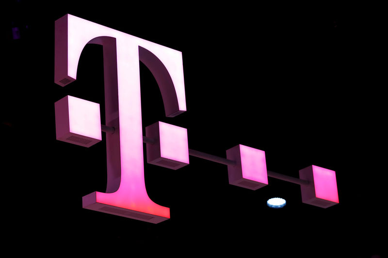 © Reuters. FILE PHOTO: A Deutsche Telekom logo is seen at the Mobile World Congress in Barcelona