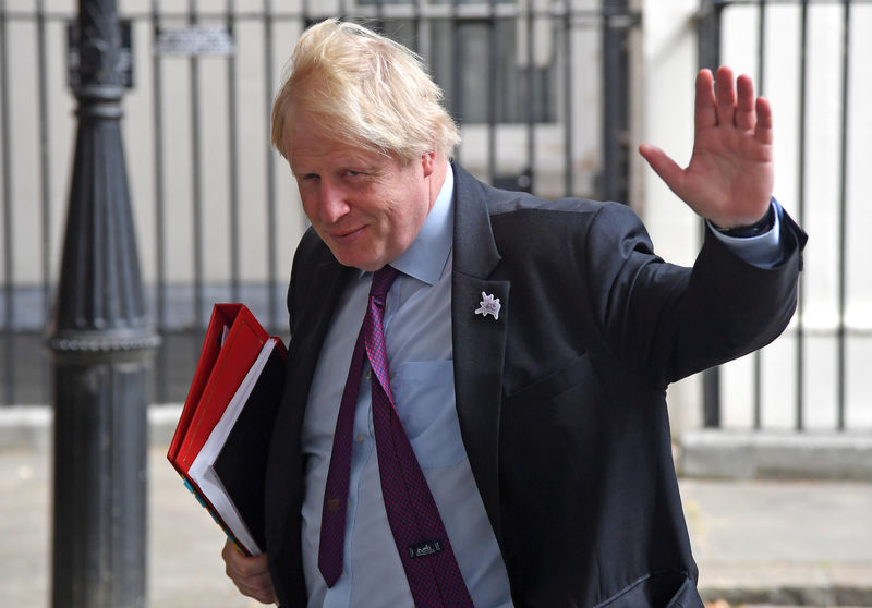 © Reuters. FILE PHOTO:  Britain's Foreign Secretary Boris Johnson waves as he leaves Downing Street in London