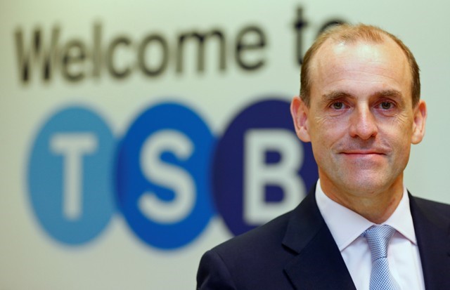 © Reuters. FILE PHOTO: Chief Executive of the TSB bank, Paul Pester, poses at the bank's Baker Street branch in London