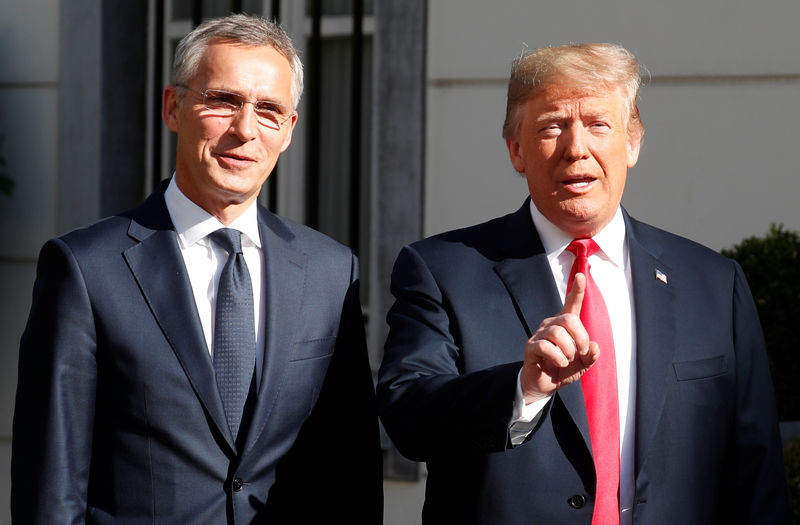 © Reuters. U.S. President Donald Trump is greeted by NATO Secretary General Jens Stoltenberg before a bilateral breakfast ahead of the NATO Summit in Brussels