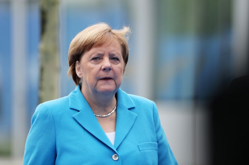 © Reuters. ميركل: على ألمانيا بذل المزيد في الإنفاق الدفاعي