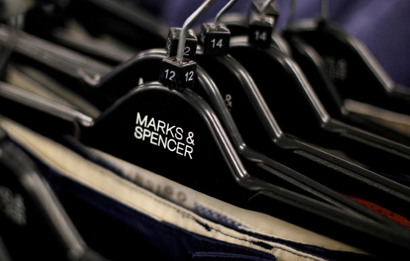 © Reuters. FILE PHOTO: File photo of clothes on hangers in a Marks & Spencer store London