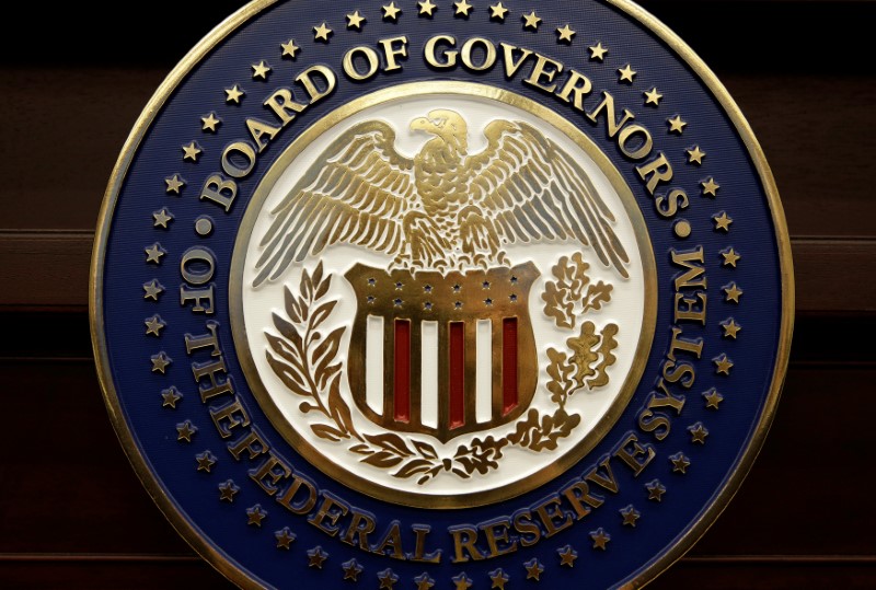 © Reuters. FILE PHOTO: The seal for the Board of Governors of the Federal Reserve System is displayed in Washington