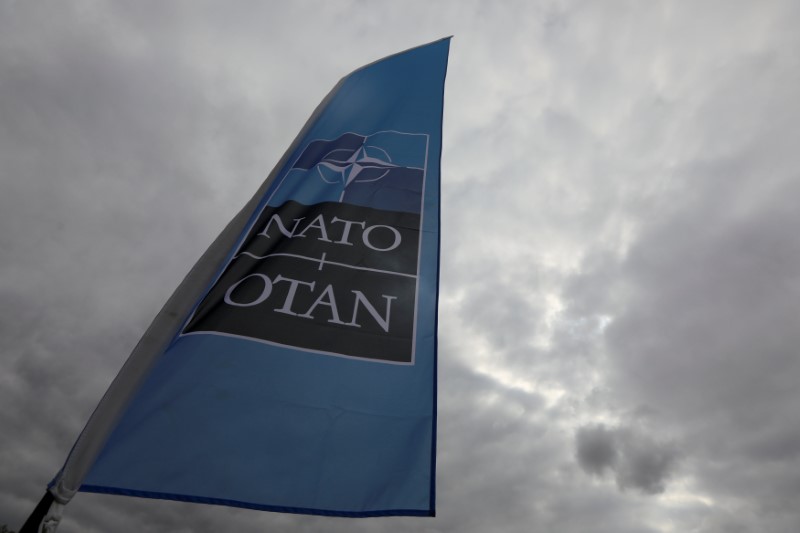 © Reuters. A NATO flag is seen ahead of the Summit in Brussels