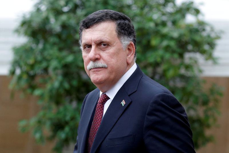 © Reuters. FILE PHOTO: Libyan Prime Minister Fayez al-Sarraj leaves after an international conference on Libya at the Elysee Palace in Paris