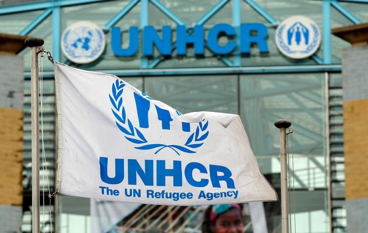 © Reuters. A flag is pictured in front of the UNHCR headquarters in Geneva