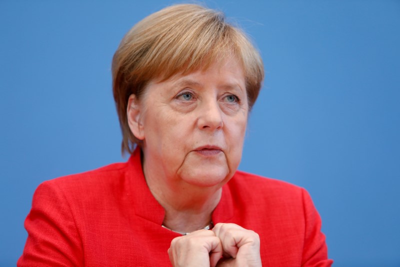 © Reuters. German Chancellor Angela Merkel holds the annual summer news conference in Berlin