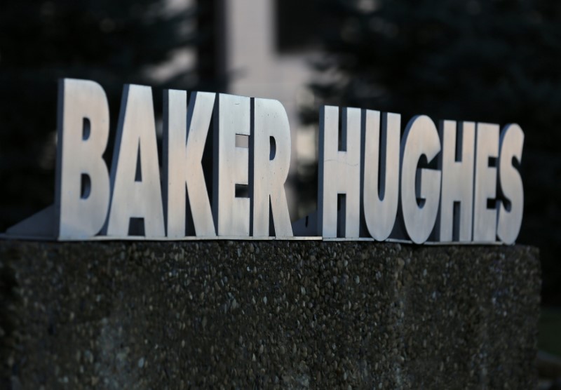 © Reuters. FILE PHOTO: A Baker Hughes sign is displayed outside the oil logistics company's local office in Sherwood Park