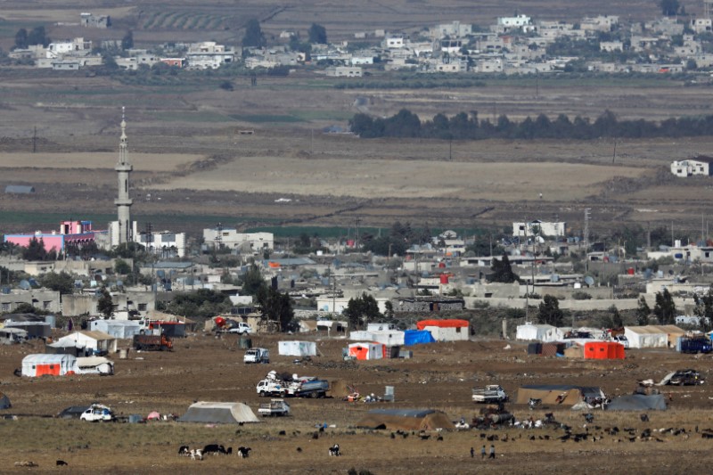 © Reuters. بدء إجلاء مقاتلي المعارضة السورية من حدود الجولان