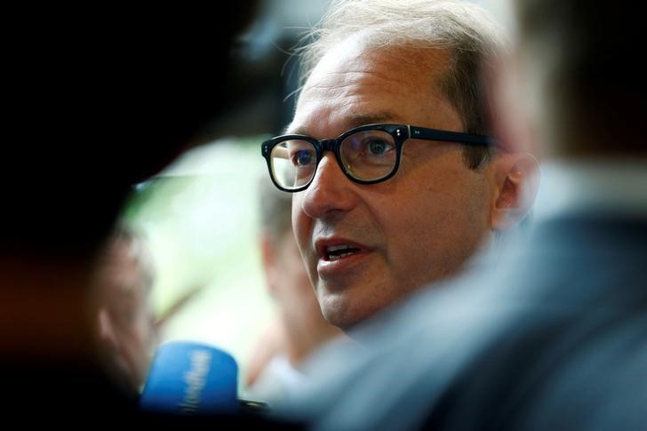 © Reuters. Parliamentary group leader of the Christian Social Union (CSU) Party Alexander Dobrindt speaks to the media before a CSU board meeting in Munich